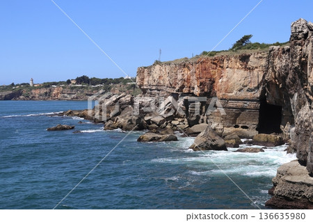 Guia Lighthouse and Boca do Inferno cliffs in Cascais, Portugal. 136635980