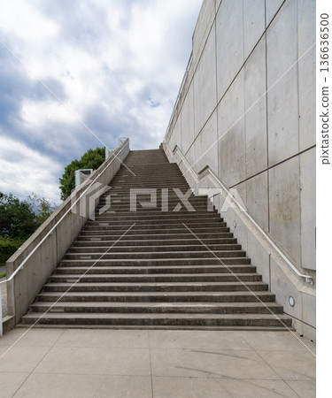 Architecture details. Stairs passage architecture. Detailed architecture. Passage with stairs leading up. Staircase passage outdoor. Staircase in modern building Architecture details. Stairs passage architecture. Detailed architecture. Passage with stairs leading up. Staircase passage outdoor. Staircase in modern building 136636500