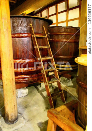 Barrels and ladders in a sake brewery Barrels and ladders in a sake brewery 136636557