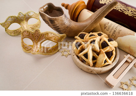 Purim celebration with hamantashen cookies and traditional jewish items Purim celebration with hamantashen cookies and traditional jewish items 136636618