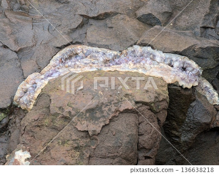 A geode in a mine in Vanda, Misiones, Argentina, containing quartz and amethyst A geode in a mine in Vanda, Misiones, Argentina, containing quartz and amethyst 136638218