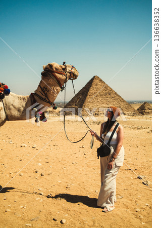 Woman Looking With Care In The Eyes Of A Camel Woman Looking With Care In The Eyes Of A Camel 136638352