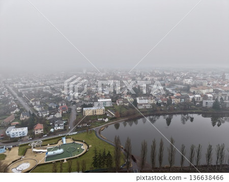 Drone Captures Suburban Waterfront View, City Planner Examines Expansion Possibilities From Above Lake 136638466