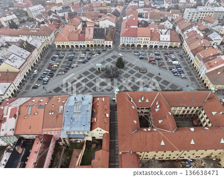Overhead View Depicting Triangular Central Courtyard With Parked Vehicles And Surrounding Buildings Overhead View Depicting Triangular Central Courtyard With Parked Vehicles And Surrounding Buildings 136638471