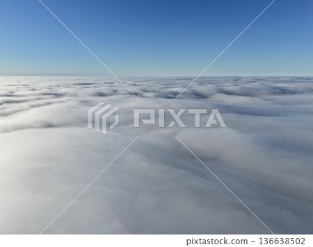 Soft Cloud Pattern Under Bright Blue Sky Establishes Calm And Peaceful Atmosphere Ideal For Unwinding 136638502
