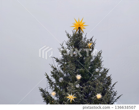 Festive Winter Scene, Traditional Winter Festivity Showcased By Illuminated Tree And Peaceful Public Setting Festive Winter Scene, Traditional Winter Festivity Showcased By Illuminated Tree And Peaceful Public Setting 136638507