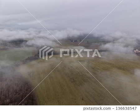 Morning Fogscape, Peaceful Dawn Over Distant Farms, Serene Sunrise With Drifting Mist And Open Fields 136638547