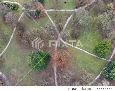 Peaceful Natural Urban Area, Serene Metropolitan Park With Winding Pathways And Lush Foliage For Visitors Peaceful Natural Urban Area, Serene Metropolitan Park With Winding Pathways And Lush Foliage For Visitors 136638562