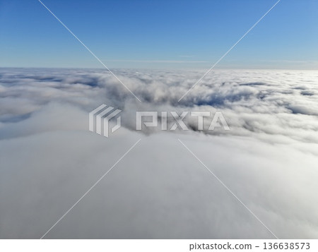 Gentle Sunrise Glow, Peaceful Early Morning Radiance Bathes Airy Clouds In Soft Golden Light Beautifully Gentle Sunrise Glow, Peaceful Early Morning Radiance Bathes Airy Clouds In Soft Golden Light Beautifully 136638573