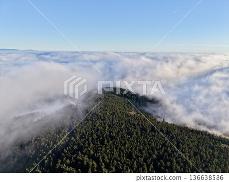 Dense Fog Engulfing Forested Ridge, Dramatic Aerial Composition With Soft Edges, Muted Tones And Secluded Mood 136638586