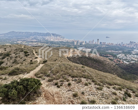 Natural Framing Of Cityscape, Mountainous Foreground Surrounds And Balances Urban Skyline Scene Natural Framing Of Cityscape, Mountainous Foreground Surrounds And Balances Urban Skyline Scene 136638609