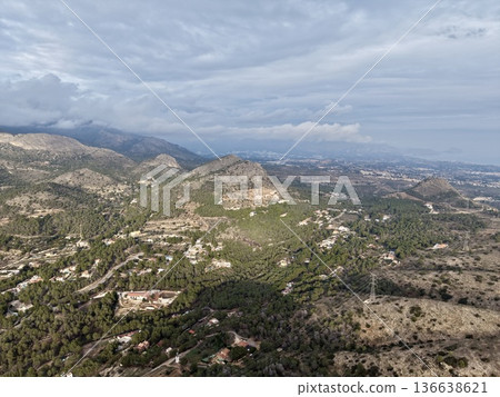 Hill With Scattered Homes And Farmland, Scenic Countryside With Terraced Fields And Old Cottages 136638621