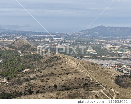 Beautiful Seaside Scene, Expansive View Of Land And Ocean, View From Above Of Mountains And Urban Area Beautiful Seaside Scene, Expansive View Of Land And Ocean, View From Above Of Mountains And Urban Area 136638631