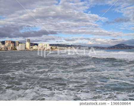 Meteorologist Captures Intense Wave Action Along City Waterfront Amid Storm Clouds Overhead Meteorologist Captures Intense Wave Action Along City Waterfront Amid Storm Clouds Overhead 136638664