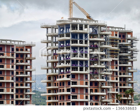 Tall Building Clusters And Cloud Cover, Skyscrapers With Repetitive Floors And Open Columns Tall Building Clusters And Cloud Cover, Skyscrapers With Repetitive Floors And Open Columns 136638683