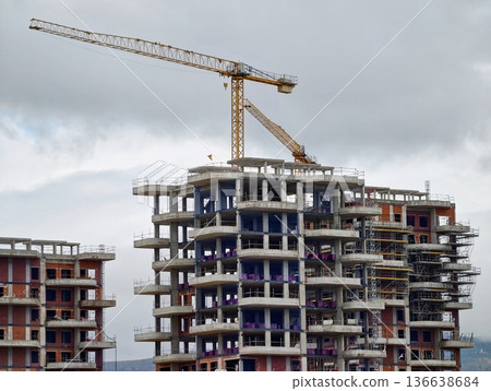 City Changes With Towering Structures, Urban Landscape Evolves With Rising Construction Equipment City Changes With Towering Structures, Urban Landscape Evolves With Rising Construction Equipment 136638684