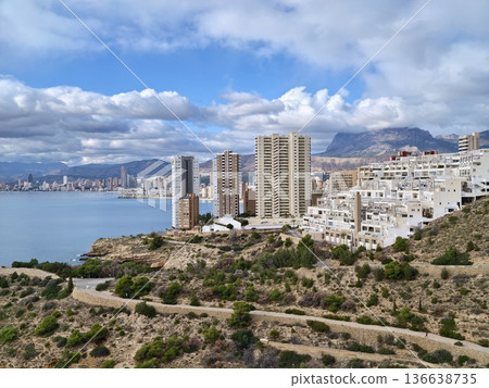 Seaside Cityscape Viewpoint, Vibrant Seaside Skyline Featuring Highrise Buildings And Mountain Backdrop Seaside Cityscape Viewpoint, Vibrant Seaside Skyline Featuring Highrise Buildings And Mountain Backdrop 136638735