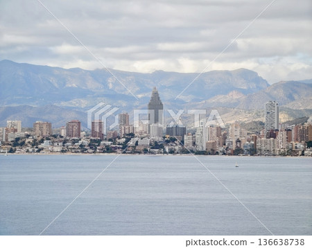 Calm Harbor With Skyscrapers Shining, Peaceful Bay Bordered By Tall Buildings And Mountains 136638738