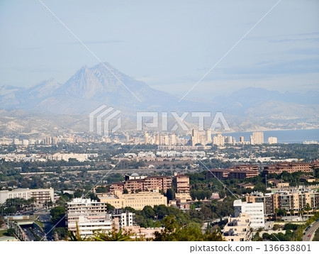 Majestic Mountain Dominates Peaceful Valley With Extensive Urban Landscape Beneath Soft Morning Light Majestic Mountain Dominates Peaceful Valley With Extensive Urban Landscape Beneath Soft Morning Light 136638801