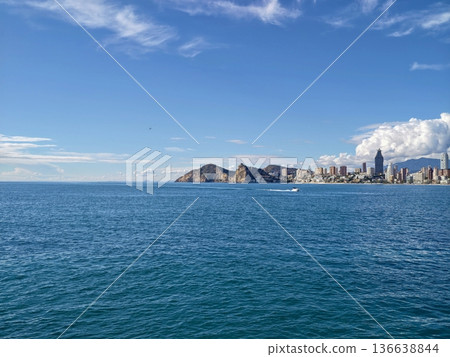 Vibrant Harbor Scene, Colorful Waterfront With Lively Activity, Bustling Marina With Palmlined Coastal Walkway Vibrant Harbor Scene, Colorful Waterfront With Lively Activity, Bustling Marina With Palmlined Coastal Walkway 136638844