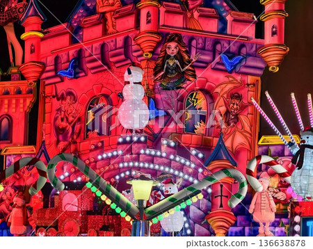 Bright Castle With Lively Characters, Vivid Storytelling Stage Featuring Ornate Towers And Neon Accents Bright Castle With Lively Characters, Vivid Storytelling Stage Featuring Ornate Towers And Neon Accents 136638878
