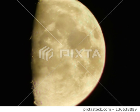 Lunar Closeup, Detailed Telescope Image Of Moon Features With Amber Hues And Soft Halo Presence Lunar Closeup, Detailed Telescope Image Of Moon Features With Amber Hues And Soft Halo Presence 136638889