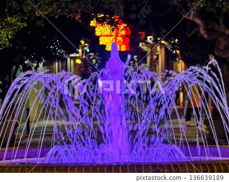 Spectacular Luminous Fountain With Flowing Streams And Vibrant Magenta Accents Illuminating Evening Spectacular Luminous Fountain With Flowing Streams And Vibrant Magenta Accents Illuminating Evening 136639189