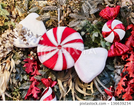 Seasonal Festive Peppermint Ornament Showcase, Traditional Holiday Scene With Peppermint And Greenery Elements Seasonal Festive Peppermint Ornament Showcase, Traditional Holiday Scene With Peppermint And Greenery Elements 136639234