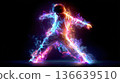 Teen boy dancing with colorful neon light effects and smoke, showcasing vibrant colors and dynamic movement against a dark background 136639510