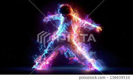 Teen boy dancing with colorful neon light effects and smoke, showcasing vibrant colors and dynamic movement against a dark background 136639510