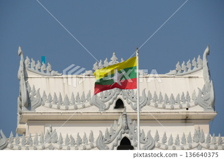 The Myanmar flag flying outside City Hall in Yangon 136640375