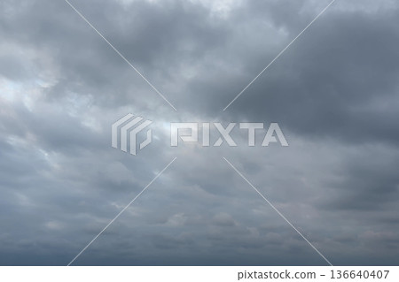 Winter sea covered in thick clouds Winter sea covered in thick clouds 136640407