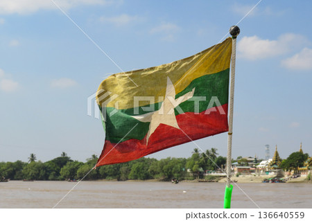 The Myanmar Flag at the Bow of a Boat The Myanmar Flag at the Bow of a Boat 136640559