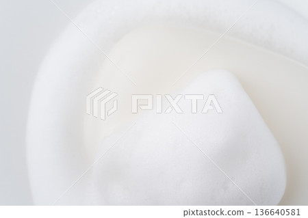 Close-up of lathered white bar soap Close-up of lathered white bar soap 136640581