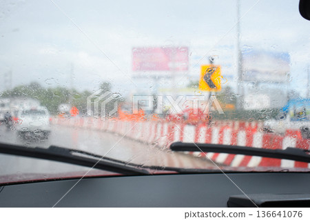 car on highway road with rainny season, blurred image car on highway road with rainny season, blurred image 136641076