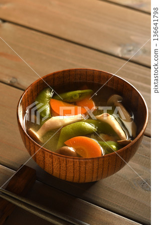 Miso soup with snap peas, carrots and shimeji mushrooms Miso soup with snap peas, carrots and shimeji mushrooms 136641798