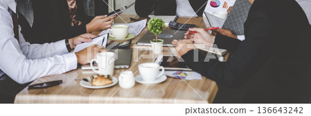 Banner Group of business people meeting in conference room. Panorama Asian businesspeople brainstorm teamwork partnership. Happy teams meeting graph chart business data meeting room with copy space Banner Group of business people meeting in conference room. Panorama Asian businesspeople brainstorm teamwork partnership. Happy teams meeting graph chart business data meeting room with copy space 136643242