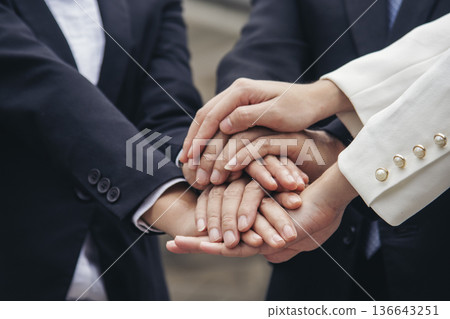 Multiethnic Teamwork friendship group brainstorming togetherness. Business people team holding hands Solidarity. Diversity business partner people teamwork holding hands together power of tag team Multiethnic Teamwork friendship group brainstorming togetherness. Business people team holding hands Solidarity. Diversity business partner people teamwork holding hands together power of tag team 136643251
