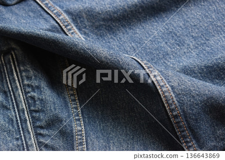 seam of blue denim texture background, jean fashion style 136643869
