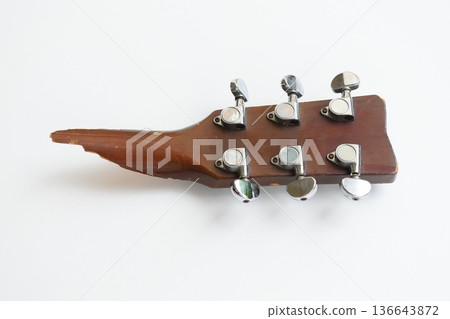 part of broken wood acoustic guitar isolated on white background part of broken wood acoustic guitar isolated on white background 136643872