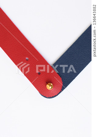 dark blue and red leather strap isolated on white background dark blue and red leather strap isolated on white background 136643882