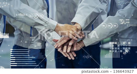 Group of workers in a circle and statistical data concept 136643927