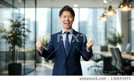 Male businessman doing guts pose 136643955