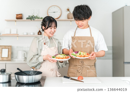 Young Asian couple cooking in the kitchen 136644019