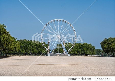 Ferris Wheel Majesty A Bordeaux, France Landmark on Display Under Clear Blue Skies Scene Ferris Wheel Majesty A Bordeaux, France Landmark on Display Under Clear Blue Skies Scene 136644370