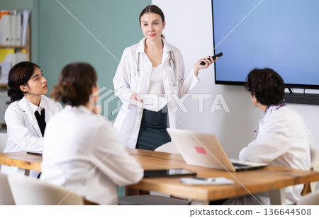 woman doctor gives a speech to students 136644508