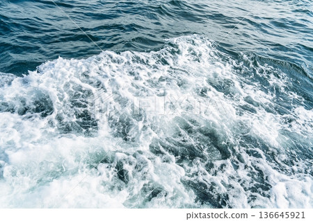 Turbulent Waters A Close-Up of Ocean Waves Crashing and Foaming with Dynamic Energy Turbulent Waters A Close-Up of Ocean Waves Crashing and Foaming with Dynamic Energy 136645921