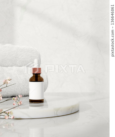 Blank label dropper bottle and towels on marble display platform with sakura cherry blossom branch. 136646861