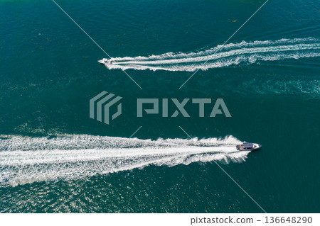 Luxury charter yacht in sea. Motor yacht luxury vessel. Sea motor boat. Sea summer vacation. Aerial motorboat. Yacht boat tour. Luxury boat yachting. Motorboat sailing at sea. Luxury vacation Luxury charter yacht in sea. Motor yacht luxury vessel. Sea motor boat. Sea summer vacation. Aerial motorboat. Yacht boat tour. Luxury boat yachting. Motorboat sailing at sea. Luxury vacation 136648290