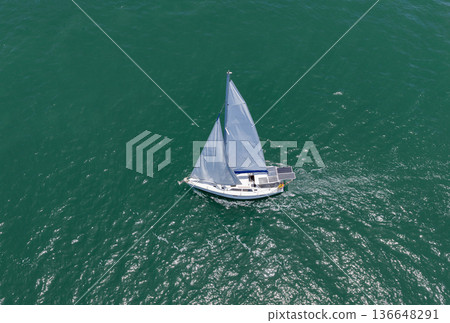 Luxury charter yacht in sea. Motor yacht luxury vessel. Sea motor boat. Sea summer vacation. Aerial motorboat. Yacht boat tour. Luxury boat yachting. Motorboat sailing at sea. Luxury vacation 136648291